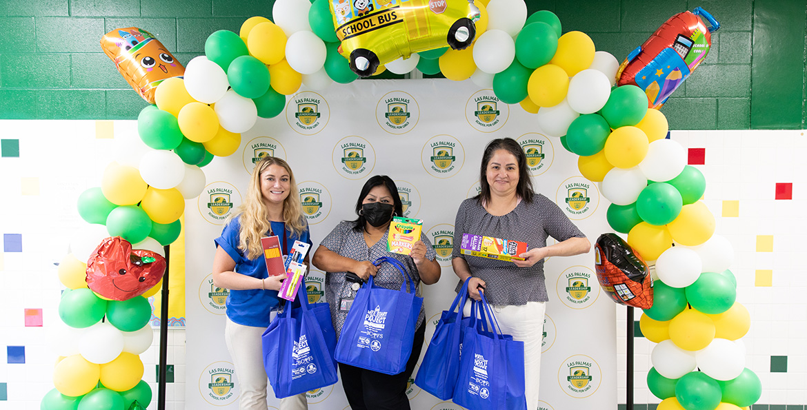Teachers at Las Palmas School for Girls pose with supplies in 2022.